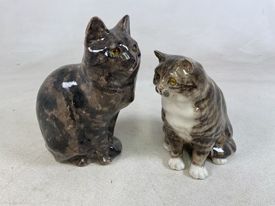 Lot 188 - WINSTANLEY POTTERY; two models of cats in...