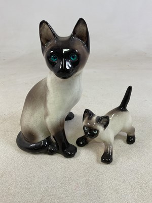 Lot 189 - WINSTANLEY POTTERY; a model of a Siamese cat...