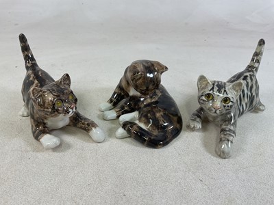 Lot 191 - WINSTANLEY POTTERY; three kitten models, two...