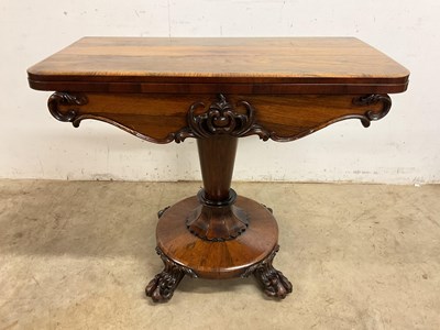 Lot 683 - A Victorian rosewood card table with twist and...