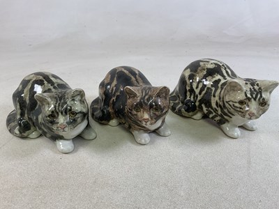 Lot 193 - WINSTANLEY POTTERY; three cat models in the...