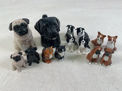 Lot 202 - QUAIL POTTERY; six cruets in the form of dogs...