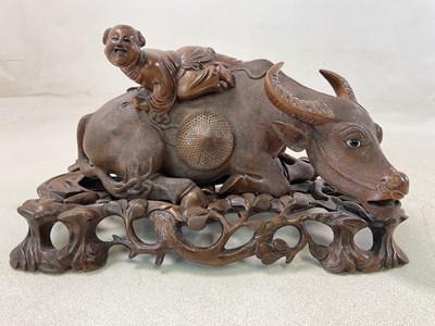 Lot 258 - A large Chinese carved wooden figure of an...