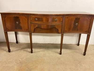 Lot 561 - A serpentine fronted inlaid Edwardian style...