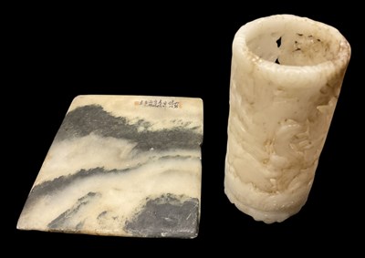 Lot 1043 - A Chinese carved pierced white jade brush pot,...