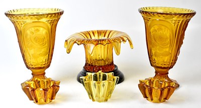 Lot 211 - A pair of 1930s amber-coloured pressed glass...