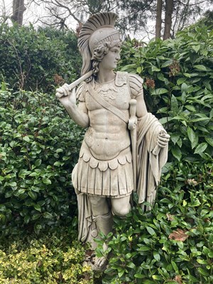Lot 1227 - A modern composition garden statue of a...