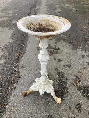 Lot 1235 - A cast iron bird bath/shallow planter, on...