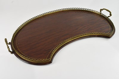 Lot 1384 - An Edwardian kidney shaped mahogany tray, with...