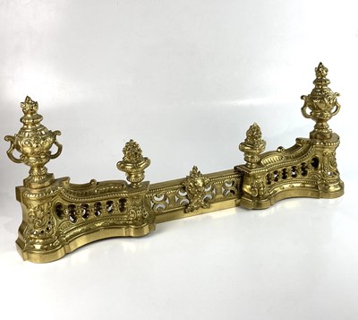 Lot 1353 - A 19th century French gilt brass chenet,...
