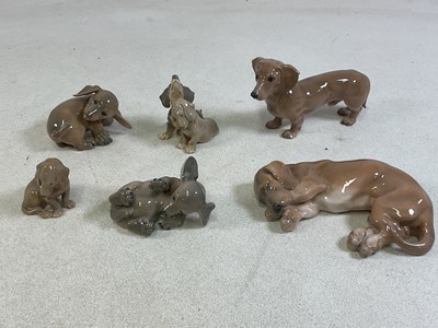 Lot 205 - ROYAL COPENHAGEN; models of dachshunds, with...