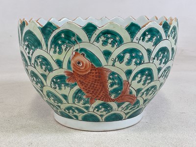 Lot 263 - A Chinese porcelain plant pot with scalloped...