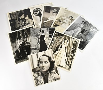Lot 2208 - MERLE OBERON; a vintage signed head and...