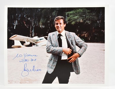 Lot 2211 - ROGER MOORE; a signed and inscribed colour 10...