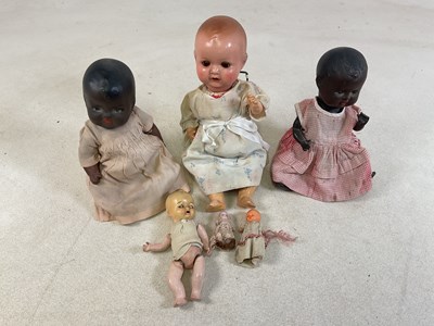 Lot 71 - A group of bisque headed dolls, to include...