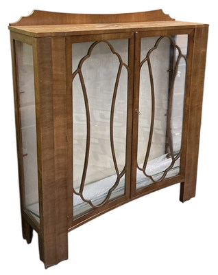 Lot 98 - A 1920s/30s Art Deco walnut veneered display...