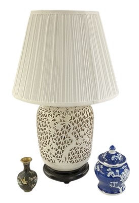 Lot 1062 - A modern reproduction Chinese white glazed...