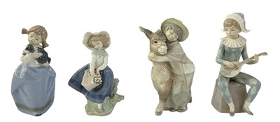 Lot 566 - LLADRÓ; three porcelain figures comprising...