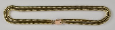 Lot 1303 - A yellow metal chunky double strand necklace,...