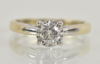 Lot 1231 - A yellow metal diamond solitaire ring, the...
