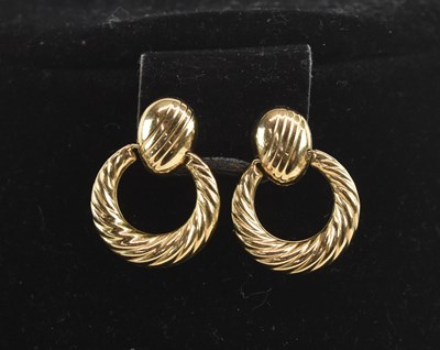 Lot 1371 - A pair of 14ct yellow gold textured hoop drop...