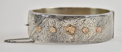 Lot 1419 - An Elizabeth II hallmarked silver snap bangle,...