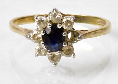 Lot 661 - A 9ct yellow gold cluster ring set with a...