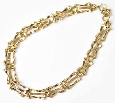 Lot 696 - A 9ct yellow gold gate link bracelet, length...