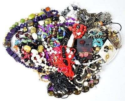 Lot 755 - A large quantity of beads necklaces, woven...