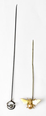 Lot 741 - A 9ct yellow gold hat pin in the form of a...