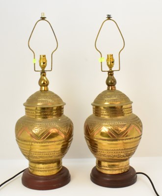 Lot 108 - A pair of large Middle Eastern inspired brass...