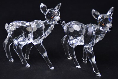 Lot 212 - SWAROVSKI: two crystal models of deer, height...