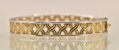 Lot 1468 - A 9ct two colour gold bracelet with yellow...