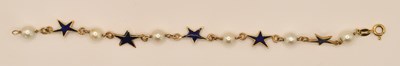 Lot 1474 - An 18ct yellow gold bracelet, with blue enamel...