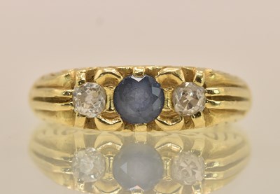 Lot 1193 - An 18ct yellow gold sapphire and diamond set...