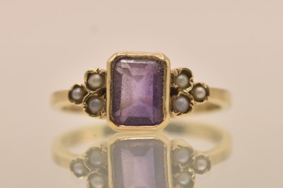 Lot 1310 - A 9ct yellow gold dress ring, with square cut...
