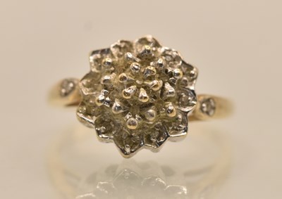 Lot 1275 - A 9ct yellow gold diamond cluster dome head...