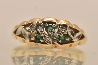 Lot 1290 - A 9ct yellow gold diamond and emerald set ring,...