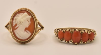 Lot 1239 - Two 9ct yellow gold dress rings, one with...
