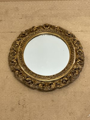 Lot 535 - A decorative oval mirror with gilt wood...