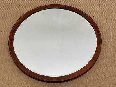 Lot 572 - An Edwardian bevelled edge circular mirror...