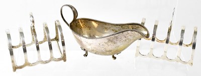 Lot 600 - A hallmarked silver four-division toast rack,...