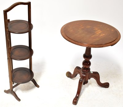 Lot 60 - An Edwardian three-tier folding cake stand,...