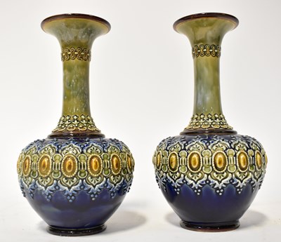 Lot 146 - ROYAL DOULTON LAMBETH; a pair of stoneware...
