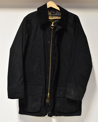 Lot 319 - BARBOUR; a black Lightweight Beaufort jacket...