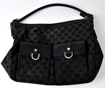 Lot 314 - GUCCI; an Abbey Pocket Hobo GG canvas handbag...