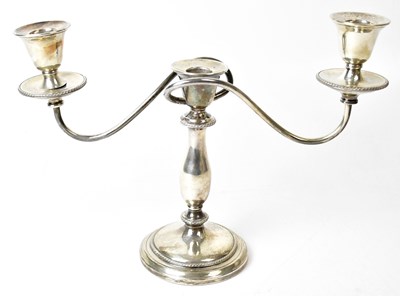 Lot 602 - An Elizabeth II hallmarked silver two branch...