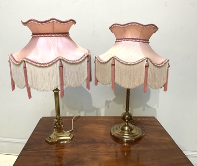 Lot 1302 - An Art Deco style brass table lamp, modelled...