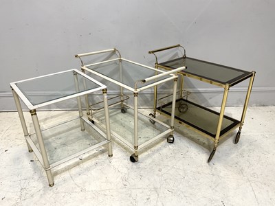 Lot 1027 - Two modern metal hostess trolleys, height 71cm,...