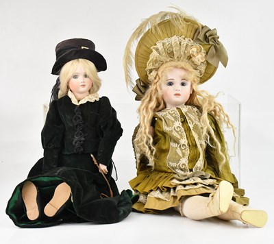 Lot 673 - A reproduction bisque head doll in the manner...